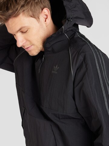 ADIDAS ORIGINALS Jacke in Schwarz