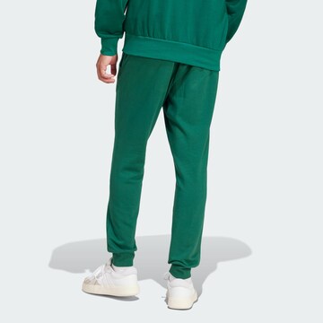 ADIDAS SPORTSWEAR Tapered Παντελόνι φόρμας 'Essentials Feel Cozy' σε πράσινο