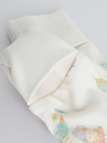 Pigiama di Next in beige