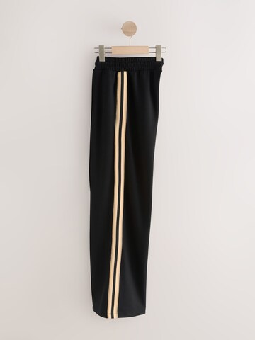 Next Szeroka nogawka Spodnie w kolorze czarny