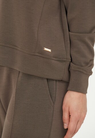 Athlecia Sports sweatshirt 'Jacey' in Brown