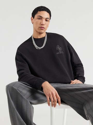 GUESS - Sudadera en negro: frente