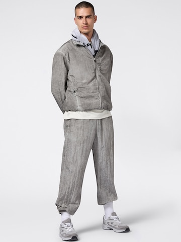 Tapered Pantaloni sportivi di Champion Authentic Athletic Apparel in grigio