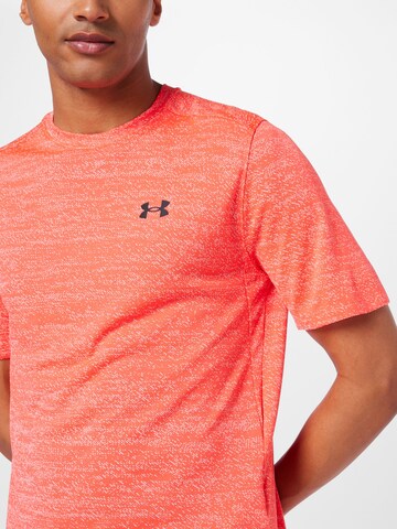 Maglia funzionale di UNDER ARMOUR in arancione