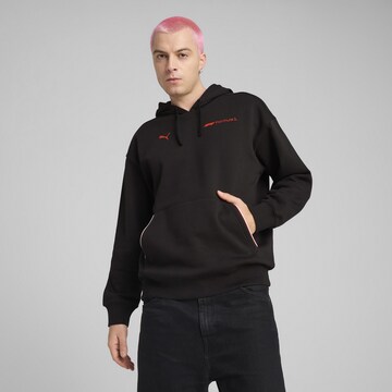 PUMA Sports sweatshirt 'ESS+' in Black: front