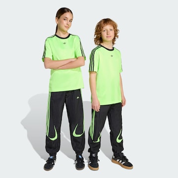 ADIDAS ORIGINALS Loose fit Trousers 'Teamgeist' in Black: front