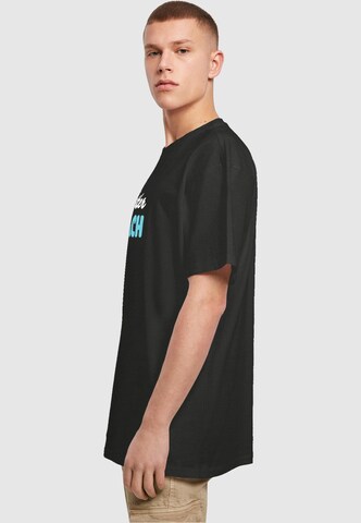 Merchcode T-Shirt 'Summer - Life Is Better At The Beach' in Schwarz