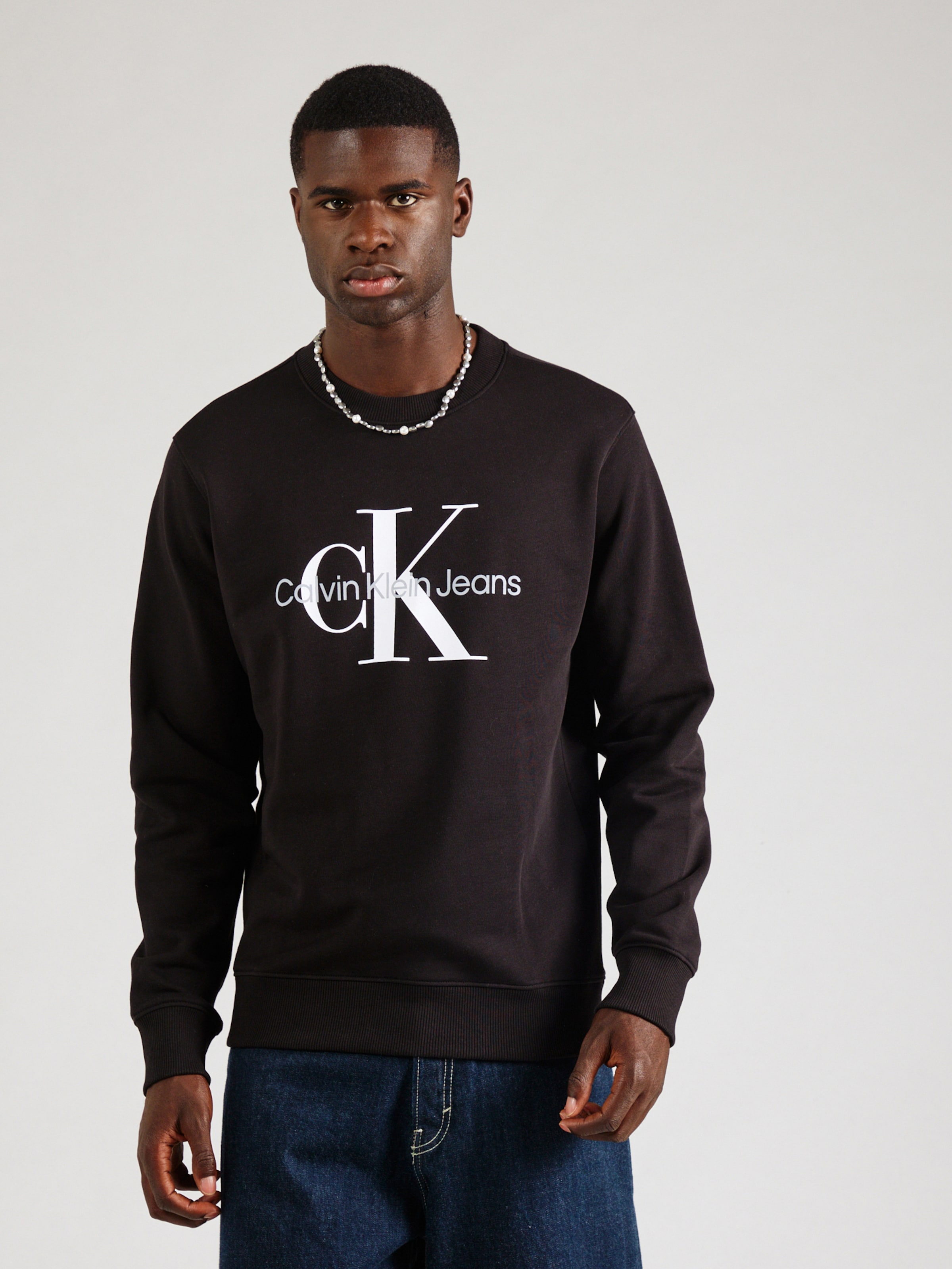 Calvin Klein Jeans Sweatshirt in Black ABOUT YOU