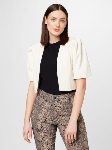 EVOKED Bolero i beige: forside