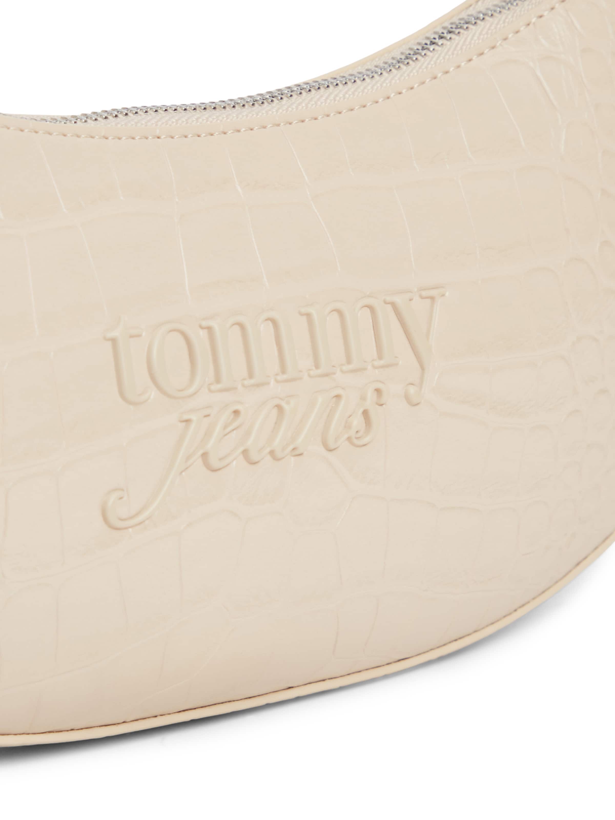 Tommy Jeans Olkalaukku 'MUST' värissä beige