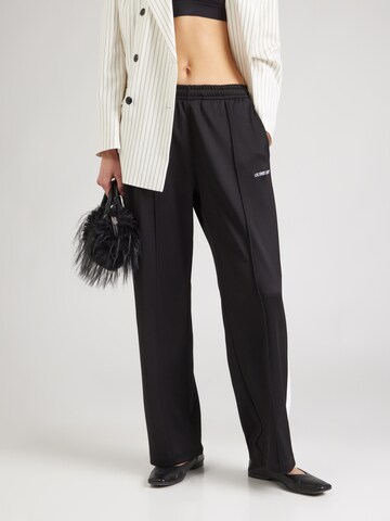 Loosefit Pantaloni di GUESS JEANS in nero: frontale