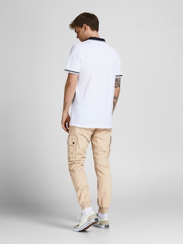 JACK & JONES Alt kitsenev Klapptaskutega püksid 'JWHPAUL JJWARNER', värv beež