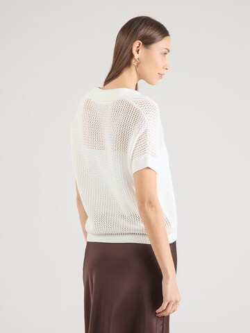 Pullover di monari in bianco