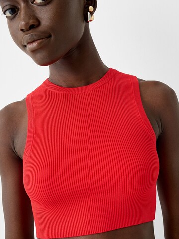 Top in maglia di Bershka in rosso