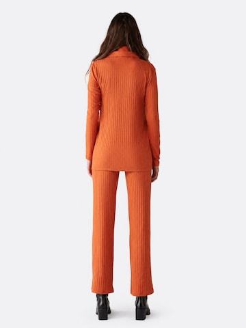 Ethiquet Knit Cardigan in Red