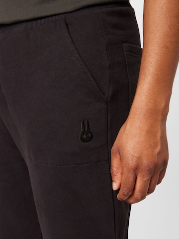 regular Pantaloni di Ocay in nero