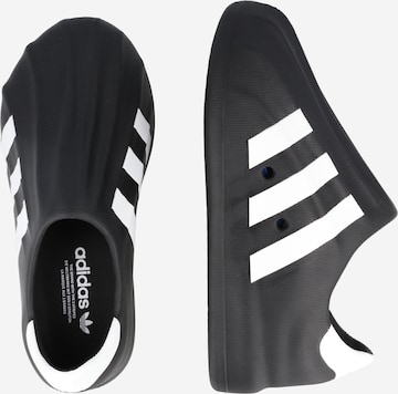 Zapatillas adidas discount negras sin cordones