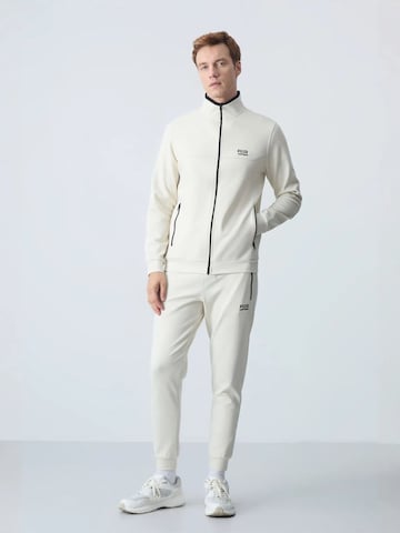 Tuta da jogging di Tommy Life in beige: frontale