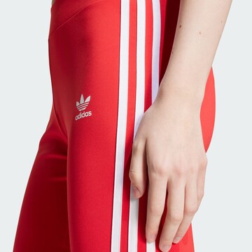 évasé Leggings ADIDAS ORIGINALS en rouge