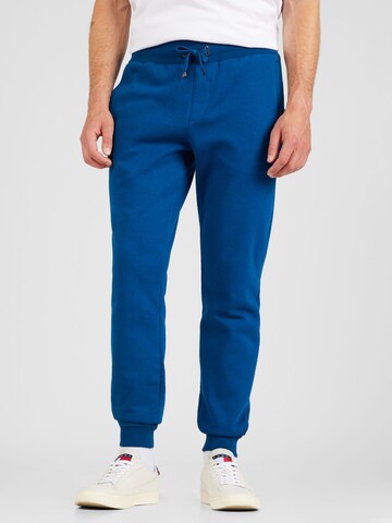 Tapered Pantaloni di TOMMY HILFIGER in blu: frontale