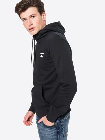 Superdry - Sudadera con cremallera deportiva en negro: frente