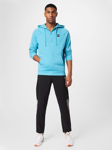UNDER ARMOUR - Sweatshirt de desporto em azul