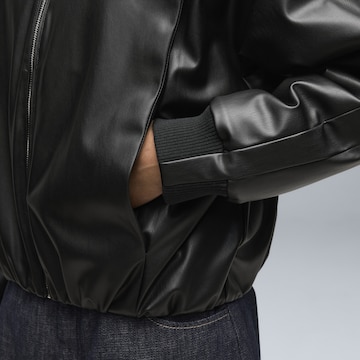 PUMA Between-season jacket 'Future Puma Archive' in Black