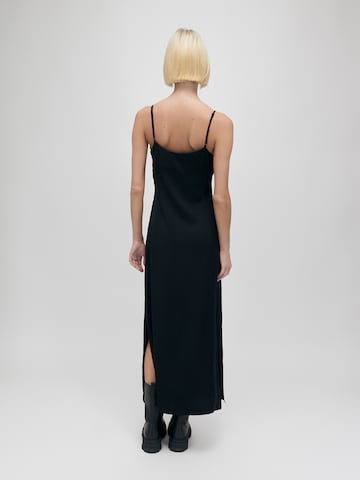 UNFOLLOWED x ABOUT YOU Dress 'REVENGE' in Black: back