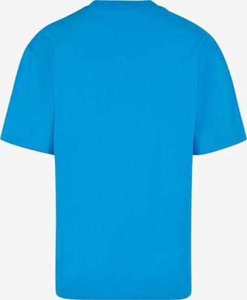 Karl Kani Shirt 'Splash Retro Tee' in Blau