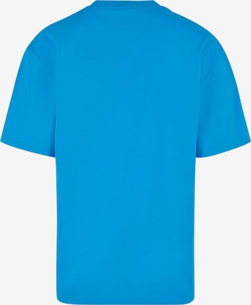 Karl Kani Shirt 'Splash Retro Tee' in Blau