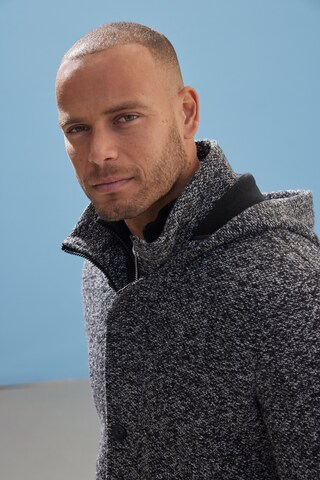 JOHN DEVIN Strickjacke in Schwarz