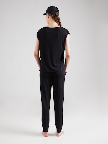 CURARE Yogawear Treenipuku värissä musta