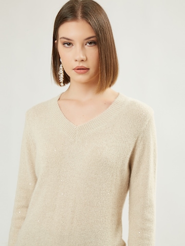 Influencer Sweter w kolorze beżowy