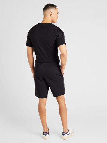 Regular Pantaloni sport de la Reebok pe negru