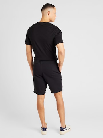 Reebok Normalny krój Spodnie sportowe w kolorze czarny