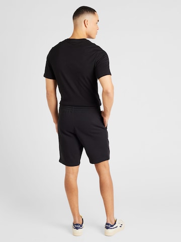 Regular Pantalon de sport Reebok en noir