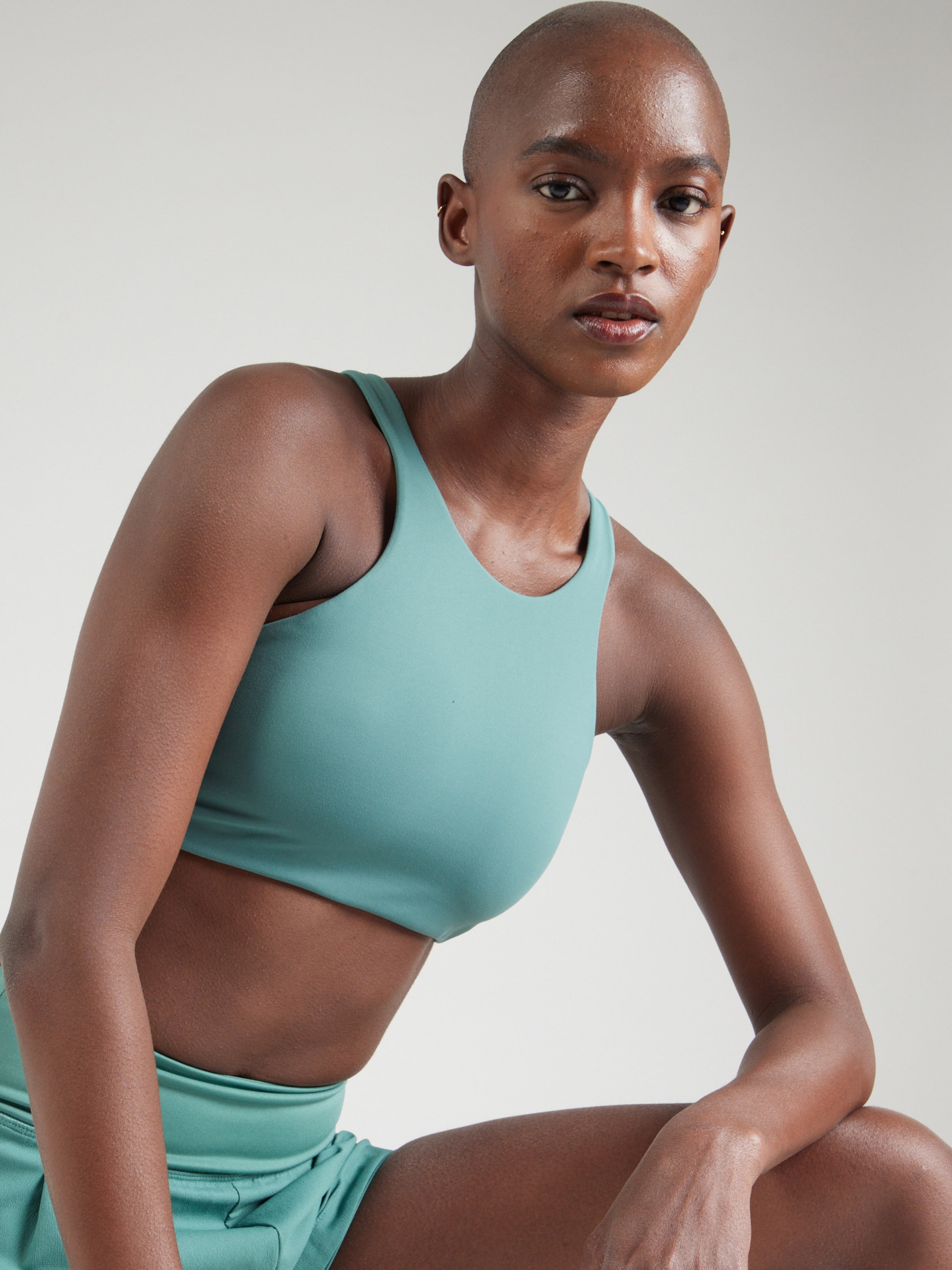 NIKE Bralette Sports bra ALATE in Green ABOUT YOU