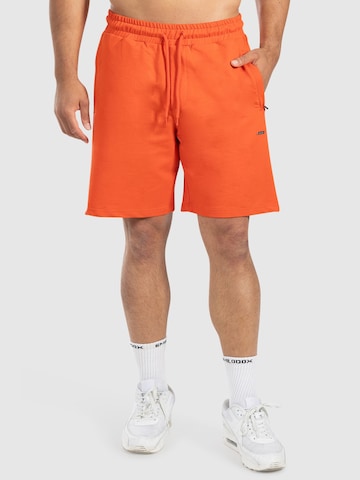 Loosefit Pantalon de sport ' Edin ' Smilodox en orange : devant