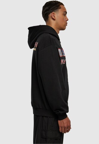 Karl Kani Zip-Up Hoodie in Black