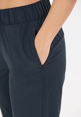 Athlecia Tapered Trainingshose 'Austberg' in Blau