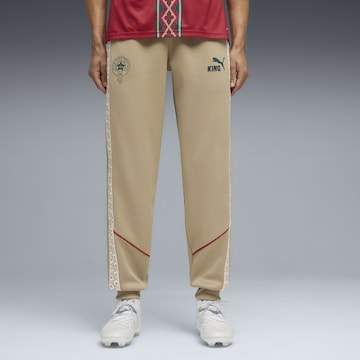 PUMA Tapered Sportbroek 'Marokko King' in Beige: voorkant