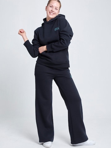 SPORTKIND - Acampanado Pantalón deportivo 'Cotton Sweatpants' en negro: frente