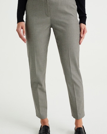 WE Fashion - Slimfit Pantalón de pinzas en beige: frente