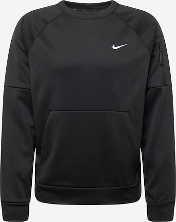 NIKE - Camiseta deportiva en negro: frente