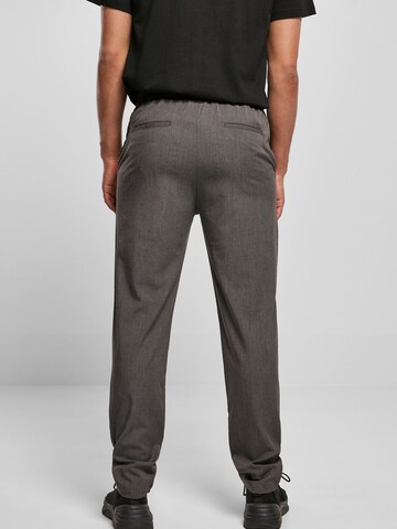 Tapered Pantaloni de la Urban Classics pe gri