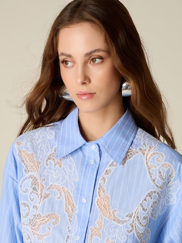 Camicia da donna di oltre in blu
