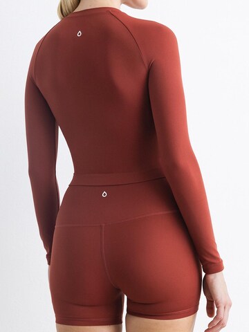 MyLibi Sports Top 'Manga Larga Hera' in Red: front