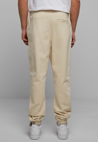 Tapered Pantaloni de la Urban Classics pe bej