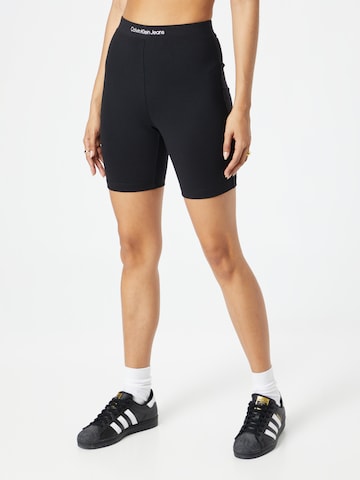 Calvin Klein Jeans Skinny Leggings in Black: front