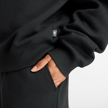 new balance Sweatshirt in Zwart